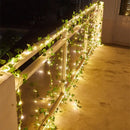 🌿 Cordão Decorativo de Luzes LED com Folhagem Artificial – Iluminação Aconchegante para Casa e Festas